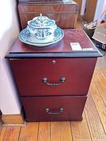 Front view of cabinet with drawers closed