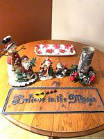 Group shot of all items including sign, tray, figurines and candle ring