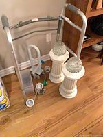 Overview of walker, tub rail, columns, globes, light fixture parts