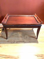 Mahogany butler coffee table front view