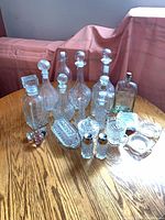 Group view showing all decanters, ashtrays, service pieces