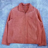 Front view of orange leather Britches jacket laid flat