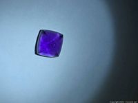 Square sugarloaf-cut amethyst on neutral background