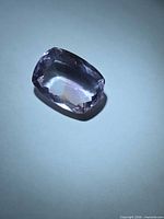 Top view of faceted cushion cut amethyst