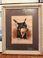 Front view of framed Doberman painting showing image, mat and decorative frame