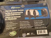 Front of packaged Fit System clip-on towing mirror showing specifications