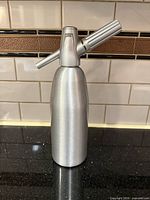 Full front view of ICO soda siphon