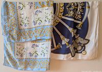 Both scarves draped to show patterns and colors