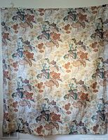 Full view of IKEA floral curtain panel hung on wall