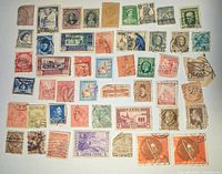 Overview of all 48 mixed worldwide stamps laid out