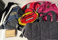 Overview of all bags and wallet in lot