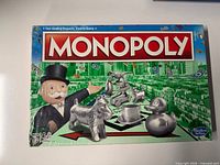 Front of sealed Monopoly board game box