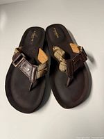 Top view of both sandals showing overall design and condition