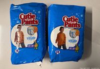 Front view showing two sealed Cutie Pants packs