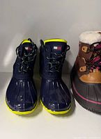 Front view of both boot pairs