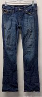 Front view of blue True Religion jeans