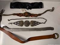 Overview of all five belts laid out