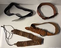 Overview of all four belts laid out