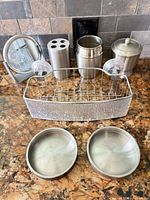all eight stainless steel bathroom items grouped