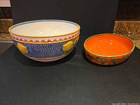 Both bowls side by side showing size comparison and overall condition