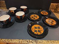 Group view of cups, saucers, dessert plates and platter