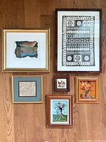 Wall view showing all six framed artworks