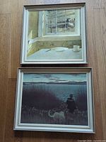 Both framed prints in off-white frames