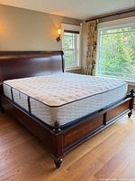 Full view of Serta Zeigler king mattress on bed frame