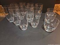 Group showing all ten tall tumblers and three short rocks glasses