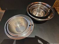 All five stainless steel mixing bowls, three nested, two separate