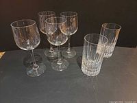 Group shot showing all four wine glasses and two highball tumblers