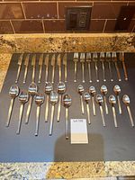 Full view of 32-piece flatware set laid out