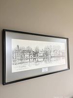 full view of framed print on wall