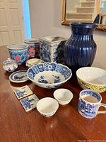 All ceramic pieces arranged on table