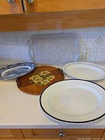 Group shot of all five platters on countertop