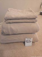 Stacked beige flannel king sheet set