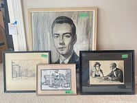 Group shot of all four framed drawings standing side by side