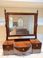 Front view showing mirror, drawers, overall design