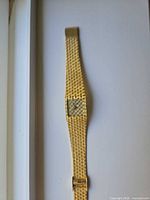 Full view of wristwatch showing bracelet and dial