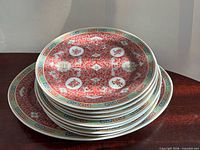 Stack of patterned plates showing design and quantity