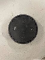 Top view showing control buttons and microphone hole