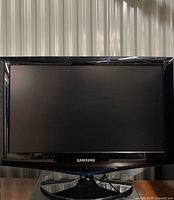 Front view of Samsung 22-inch LCD TV on stand