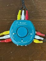 Top view of V-STAR AV-3 selector showing rotary dial and connected RCA cables