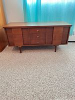 Overall front view of Lane cedar chest showing drawers, panels and legs