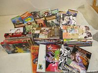 All 35 manga and novels laid out on table