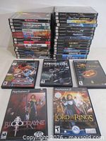 Front view of both game stacks and five highlighted cases laid flat