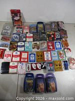 All 53 decks arranged on floor showing variety and packaging
