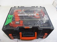 Closed toolbox showing brand, handle and latches