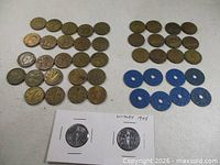 Group image showing all coins and tokens laid out