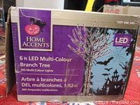 Box front showing brand, product name, height, LED multi-colour lights